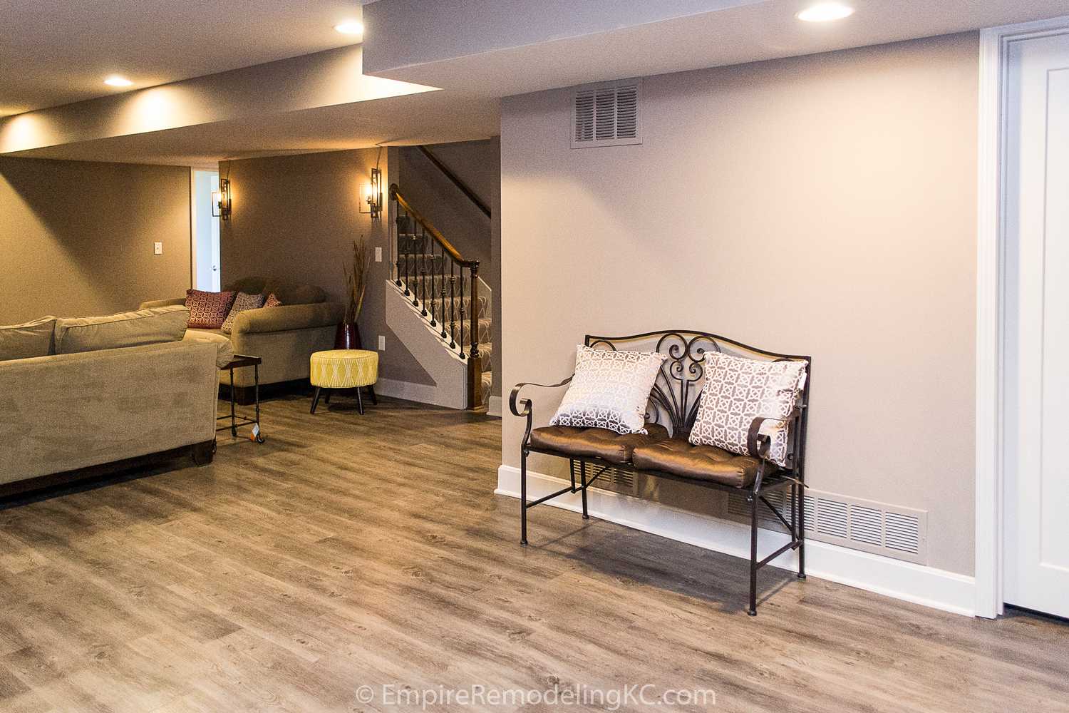 Basement remodel with kitchen, wetbar, bathroom, living area and bedrooms