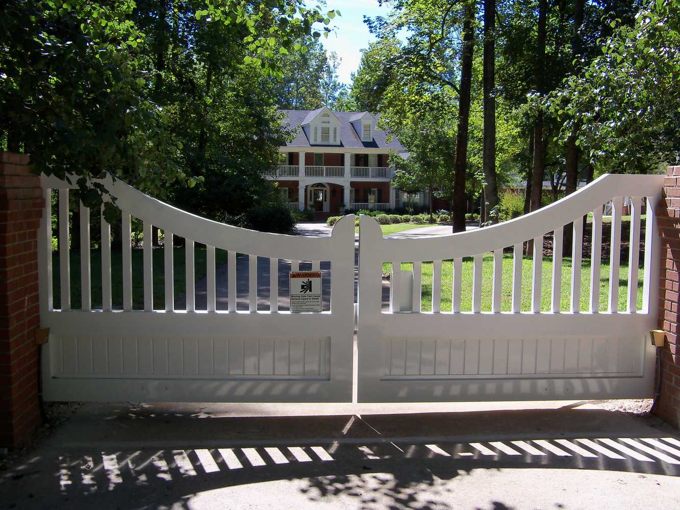 Residential Gates, Subdivision Entry gates, roadwork, stonework etc. Commercial gates