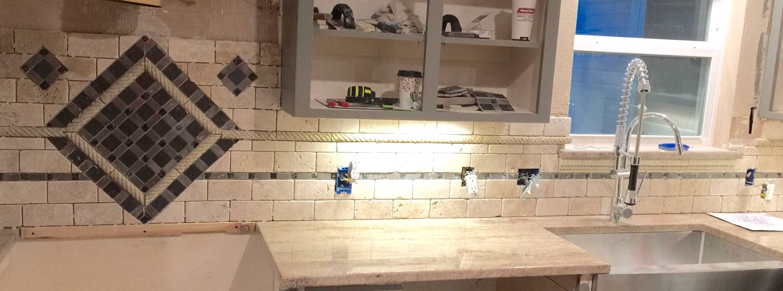 Hidden safe, complete kitchen remodel custom mosaic backsplash and cabinets