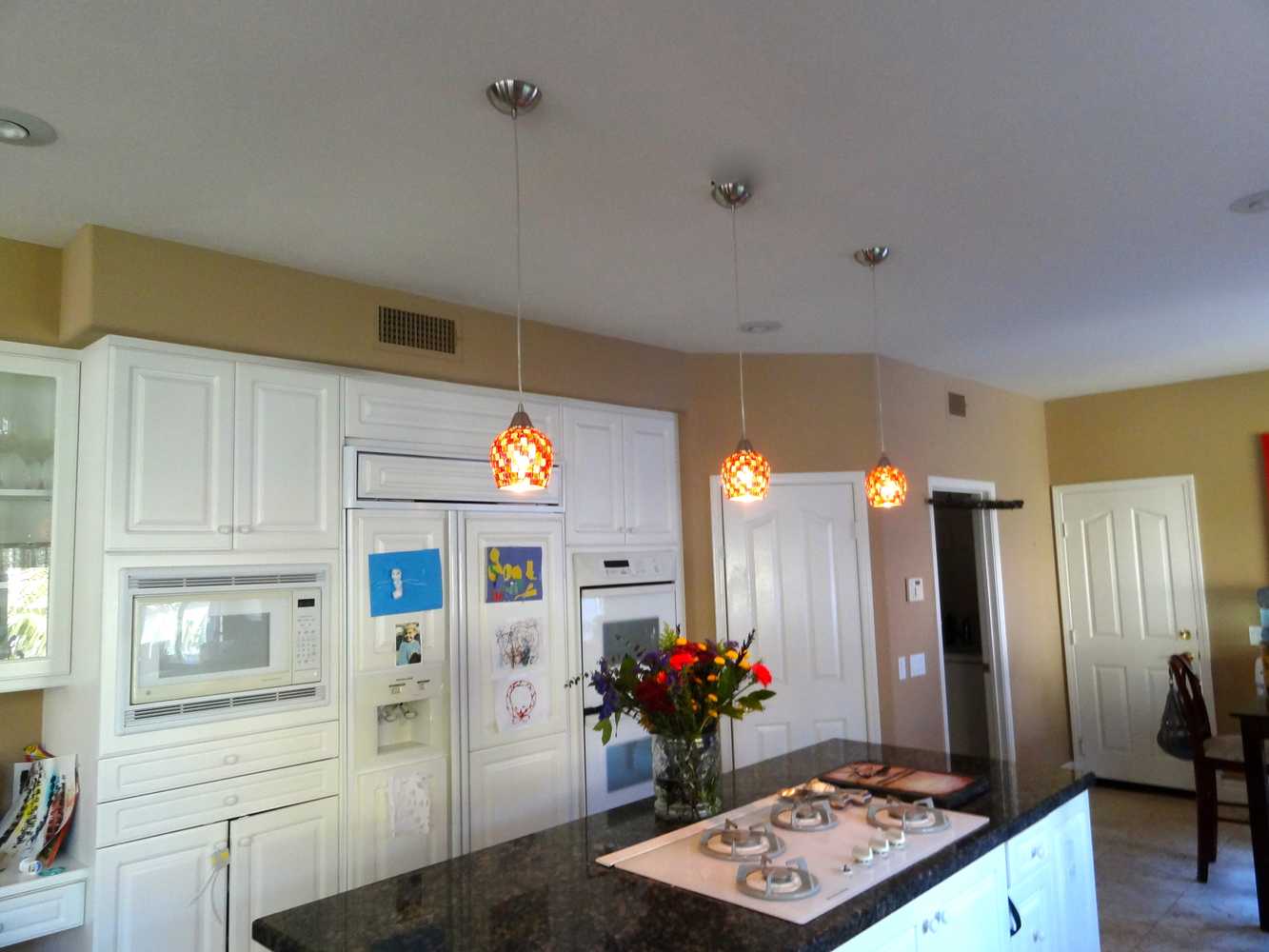 Carlsbad, Ca, kitchen pendants over Islands, and Dining chandalier.