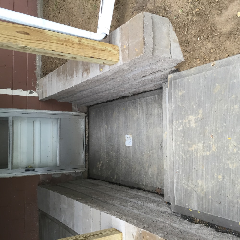 Retaining walls concrete pads and patio