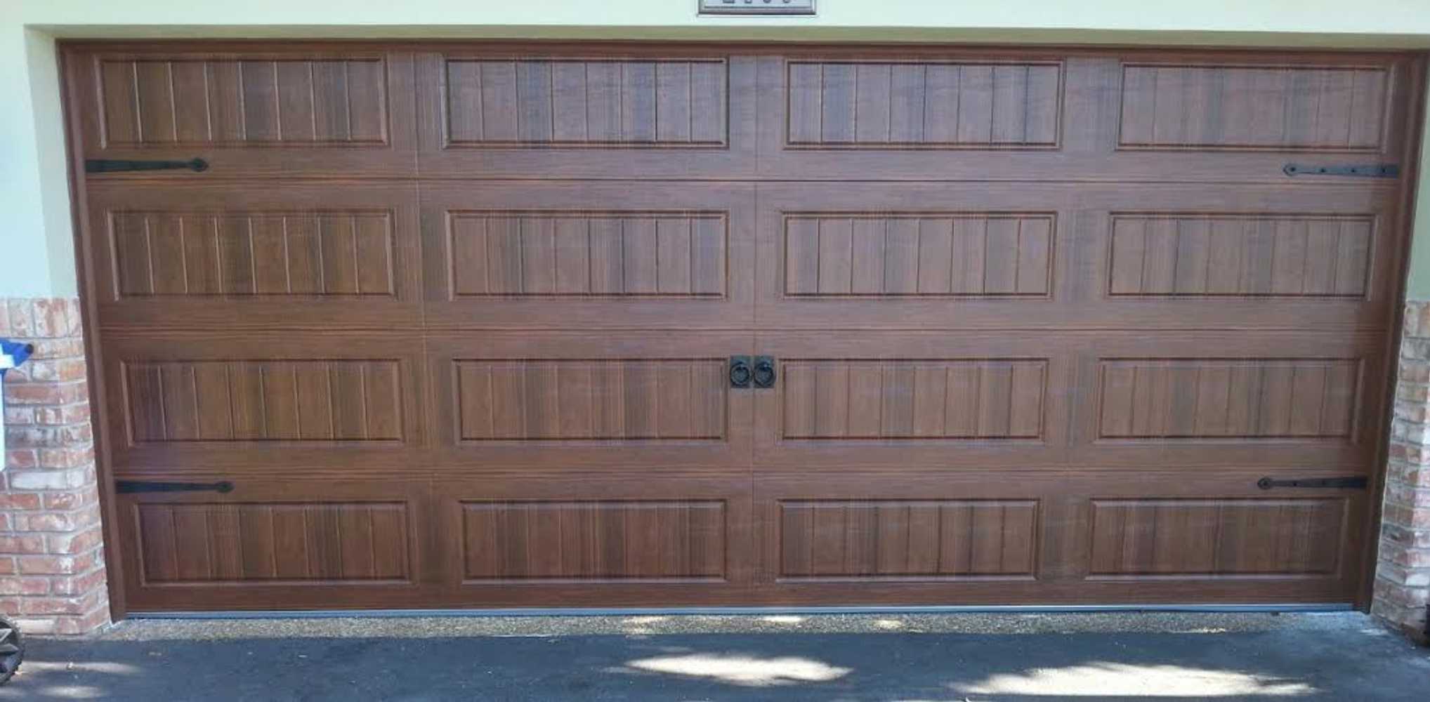 View our work: Garage Door Solutions Corp