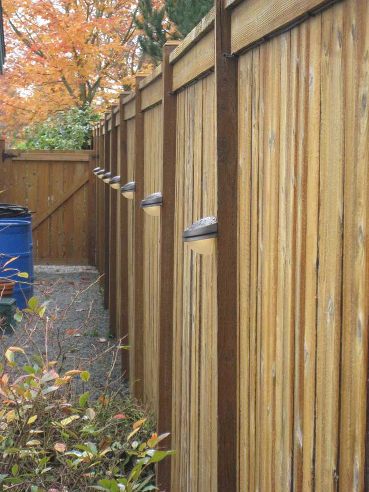 Walkway lighting and fence stain