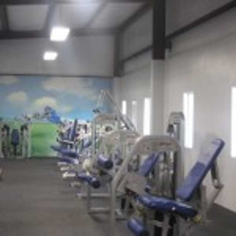 Rocket Club Weight Room by C.H.I. Construction Inc.