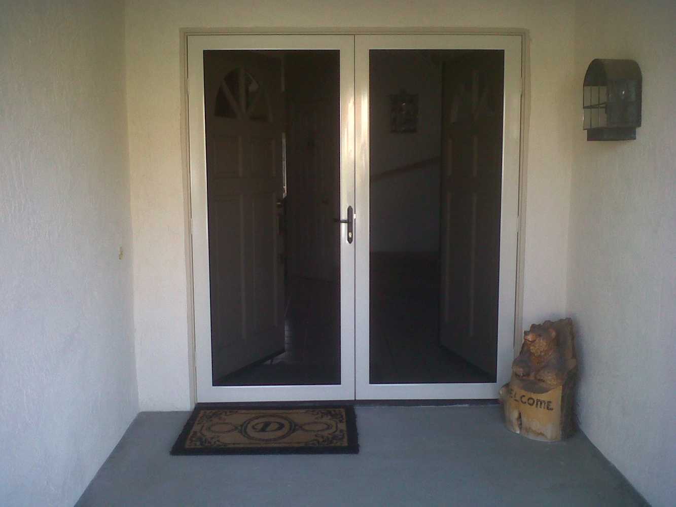 French Roll-Away Retractable Screen Doors