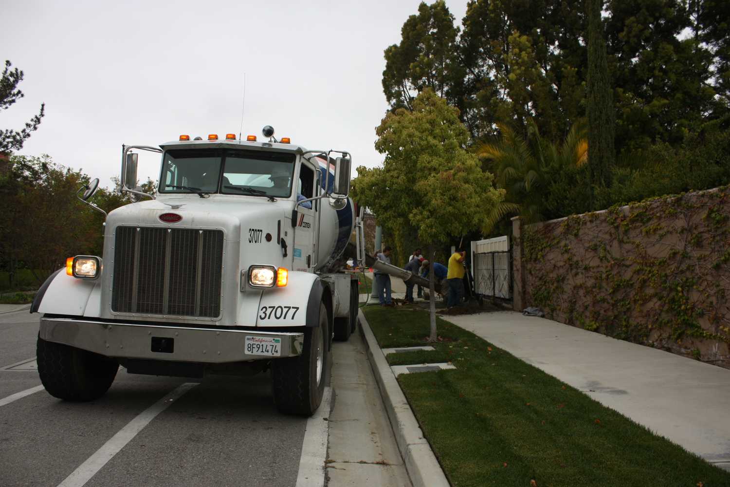 Repairing Sidewalks In Fremont Place.