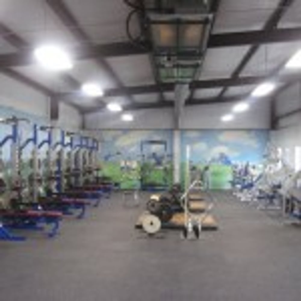 Rocket Club Weight Room by C.H.I. Construction Inc.