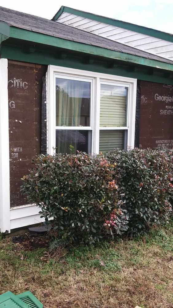 John's vinyl siding and shutter replacement job. Front porch posts replacement and rotted wood replacement and Repairs.