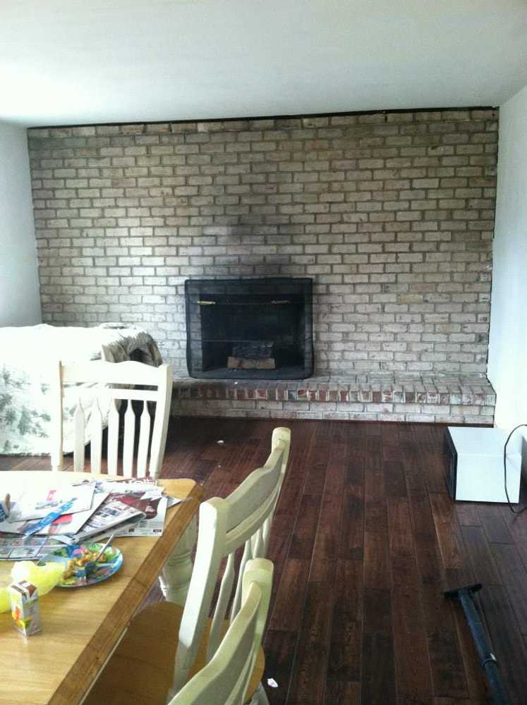 bookshelves and stone work on old fireplace