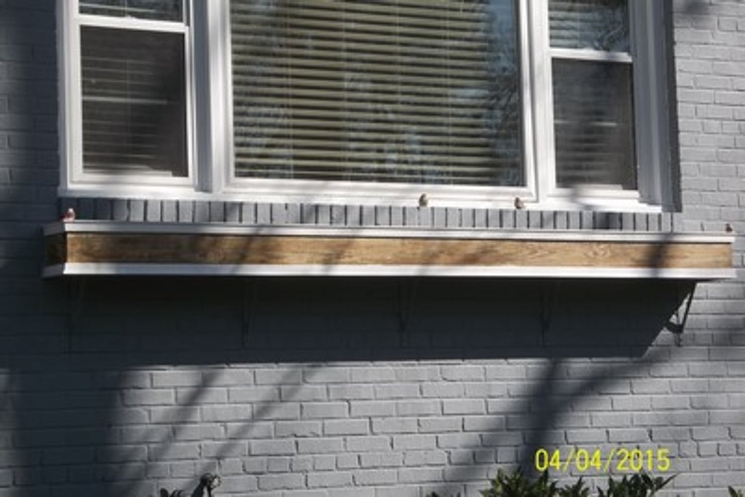 EXTERIOR PAINT BRICK (WHOLE HOUSE) AND DETACHED GARAGE