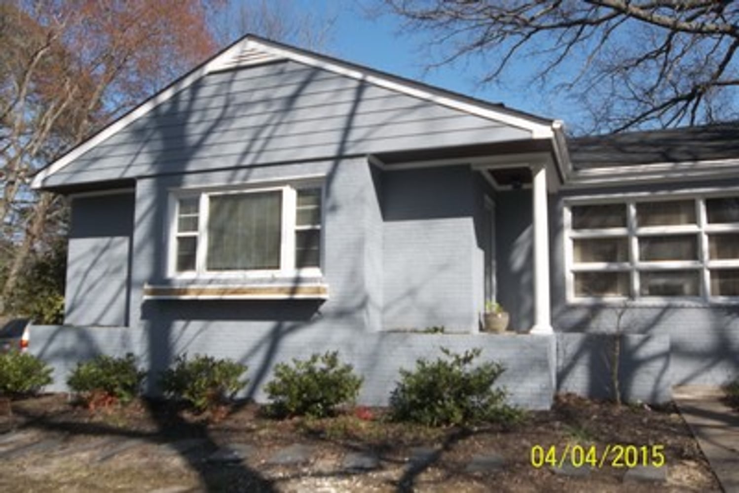 EXTERIOR PAINT BRICK (WHOLE HOUSE) AND DETACHED GARAGE