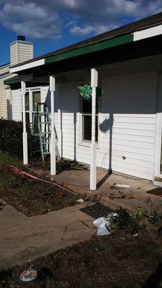 John's vinyl siding and shutter replacement job. Front porch posts replacement and rotted wood replacement and Repairs.