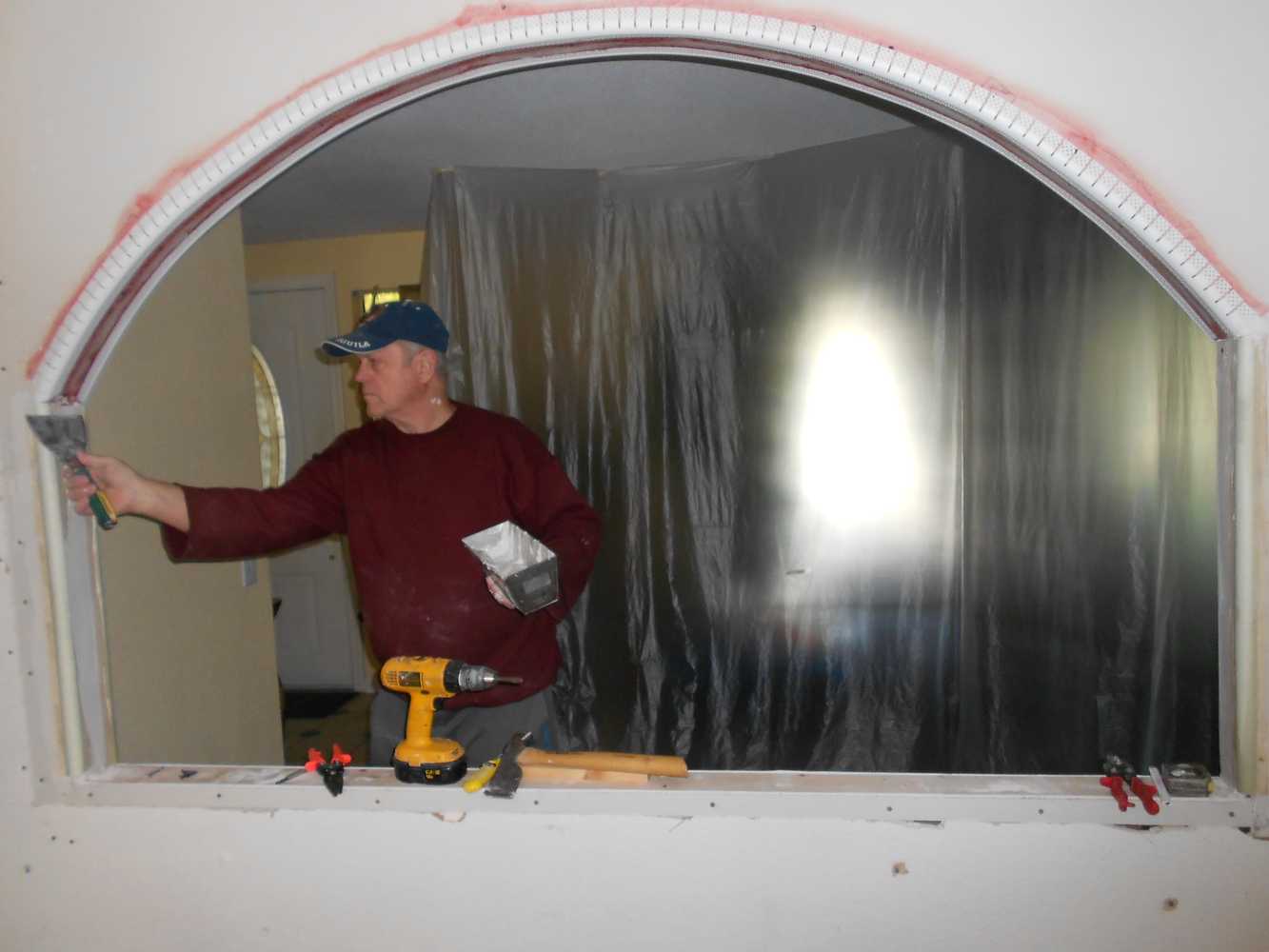 Archway from family room to living room