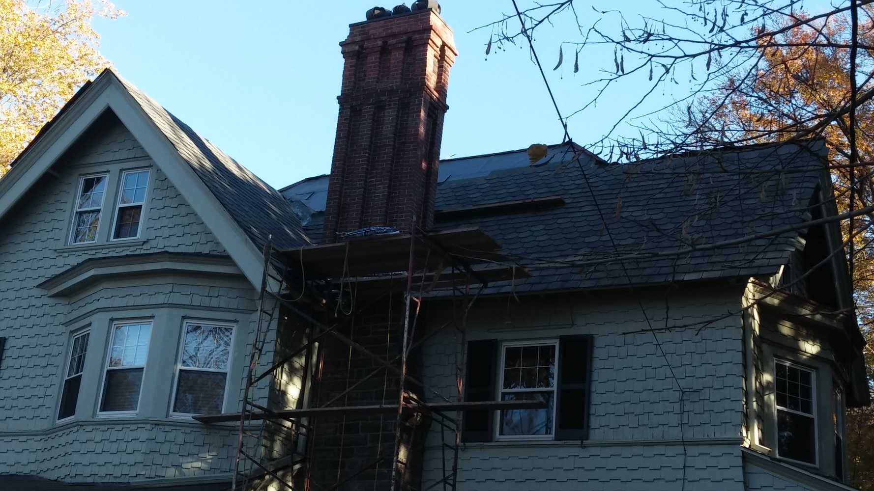 slate to asphalt custom shingle roof with top chimney rebuild