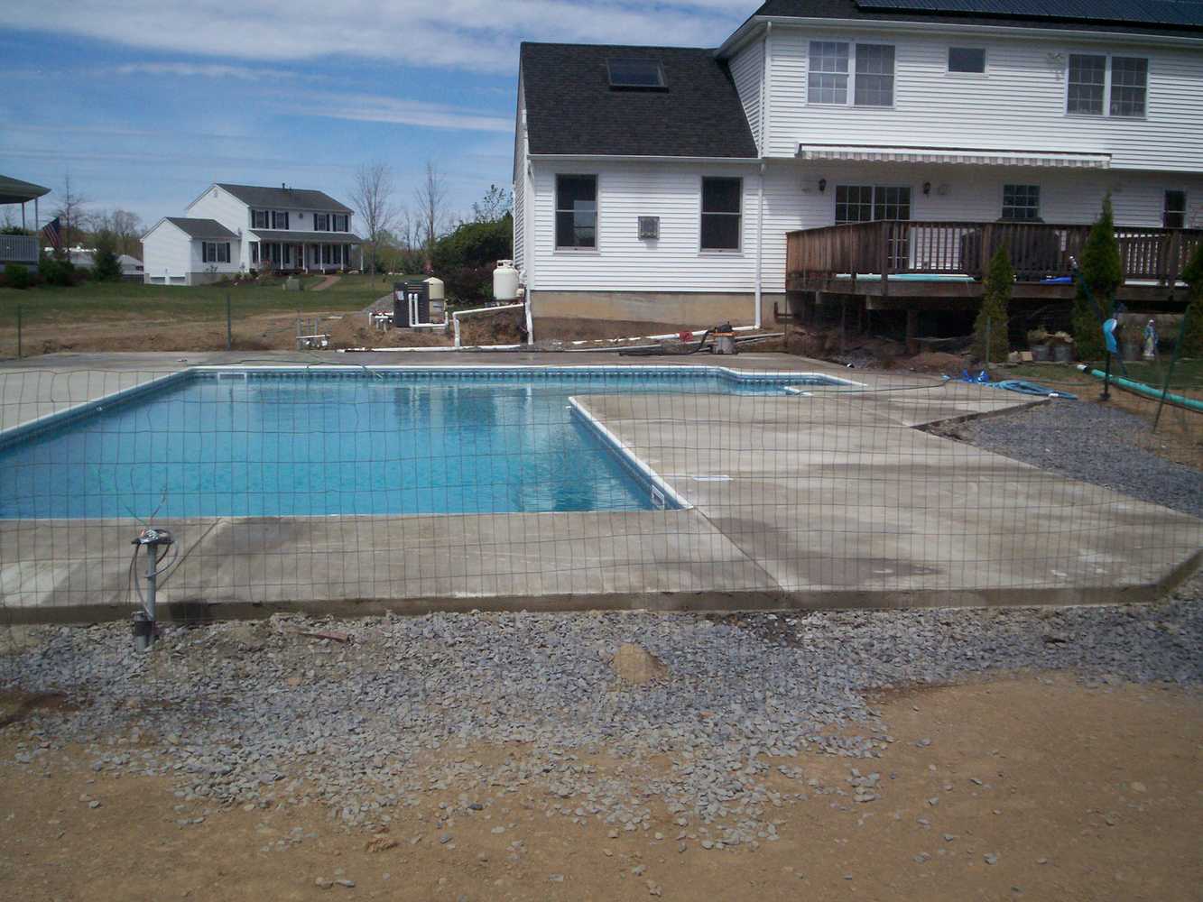 Concrete pool surround with broom finish