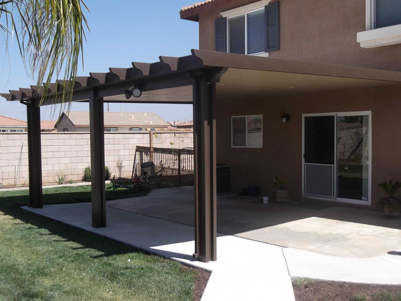 Solid & Lattice patio covers & rain gutters