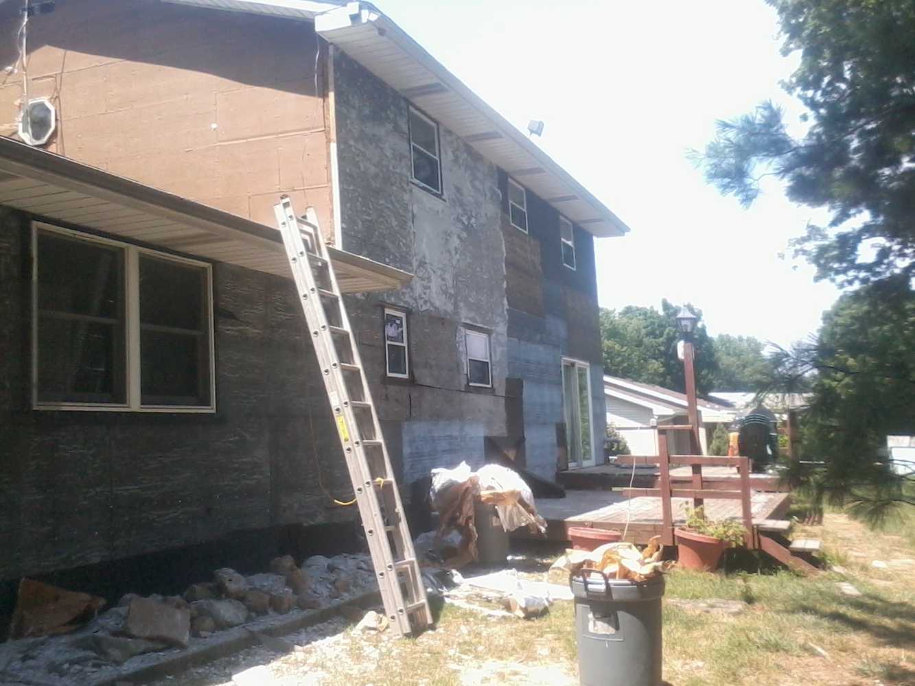 Installing stone and stucco