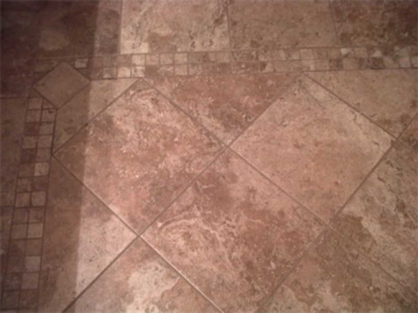 Stone tile with mosaic border