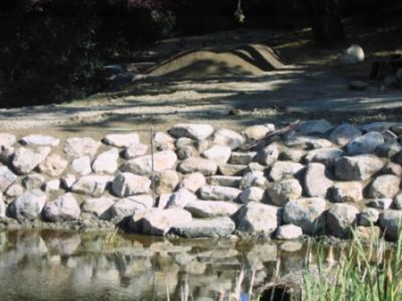 Sonoma County pond and residence hardscaping