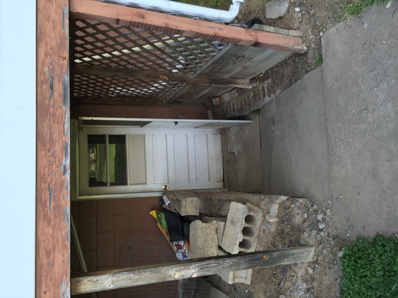 Retaining walls concrete pads and patio