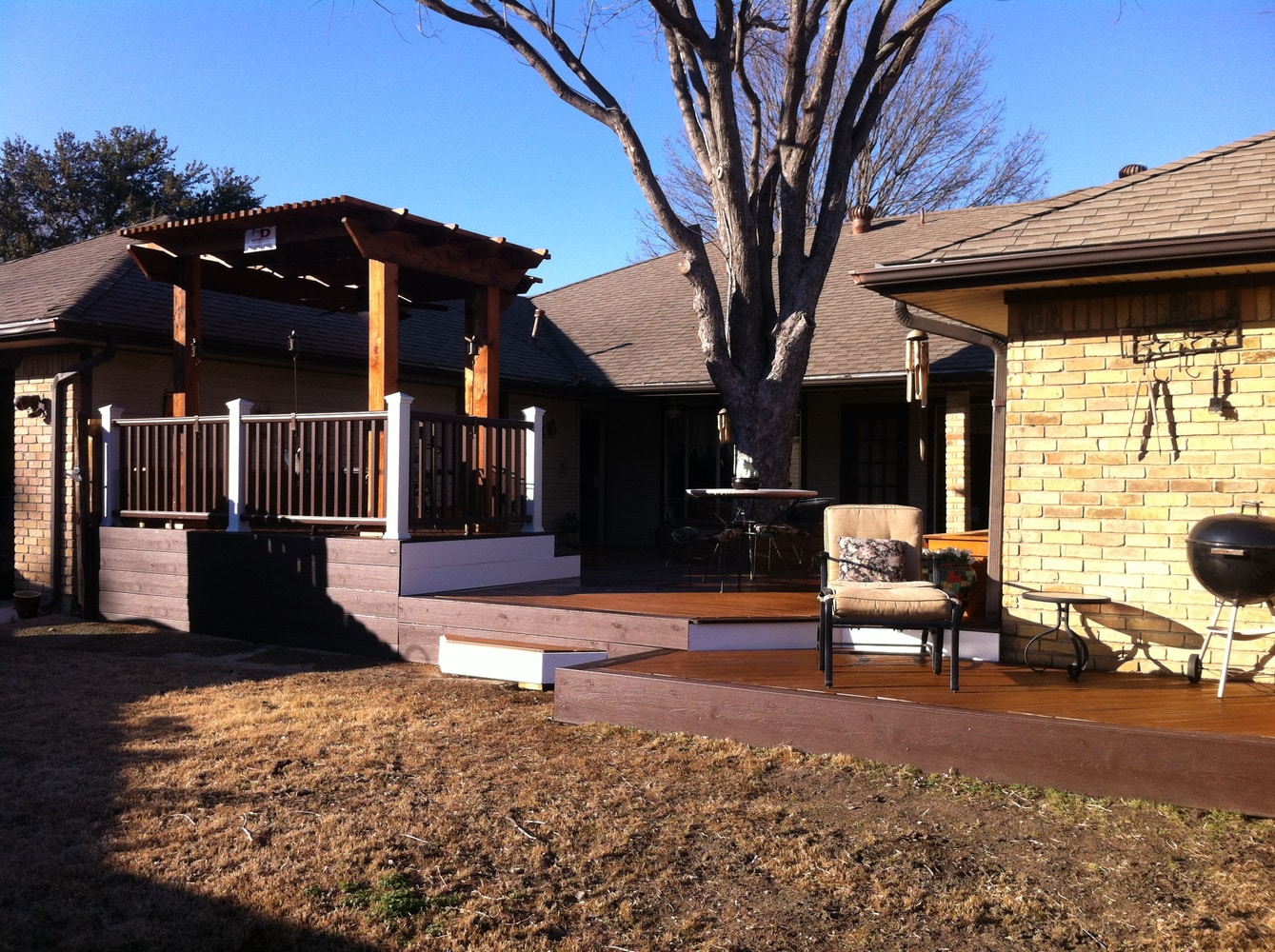 Custom composite deck with cedar arbor, amenities