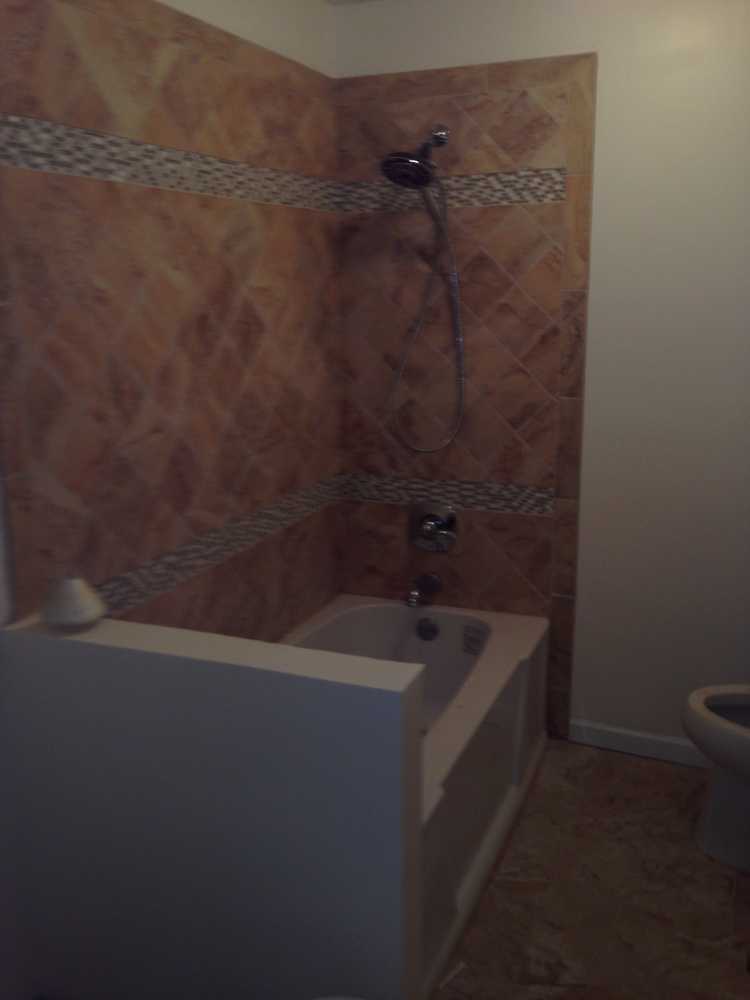 Bathrooms we redone the one with oak mirror n cabinet is a before