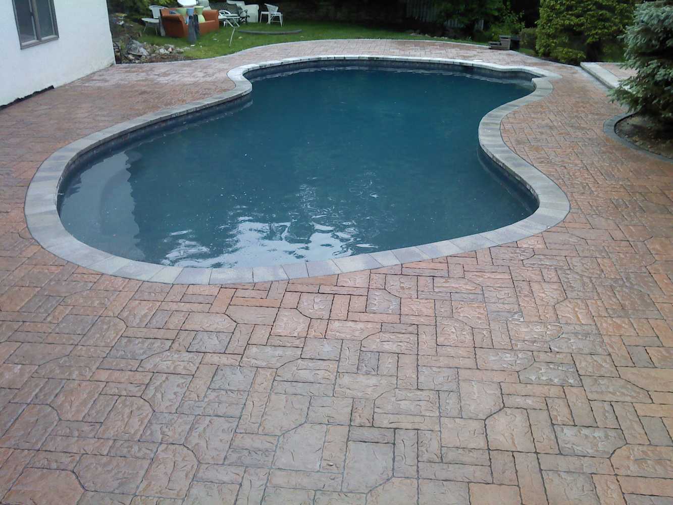 Installation of concrete Patios around of In-ground swimming Pools.