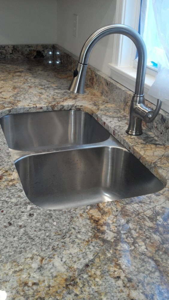 Project photos from Unlimited Kitchens and Bath Inc.