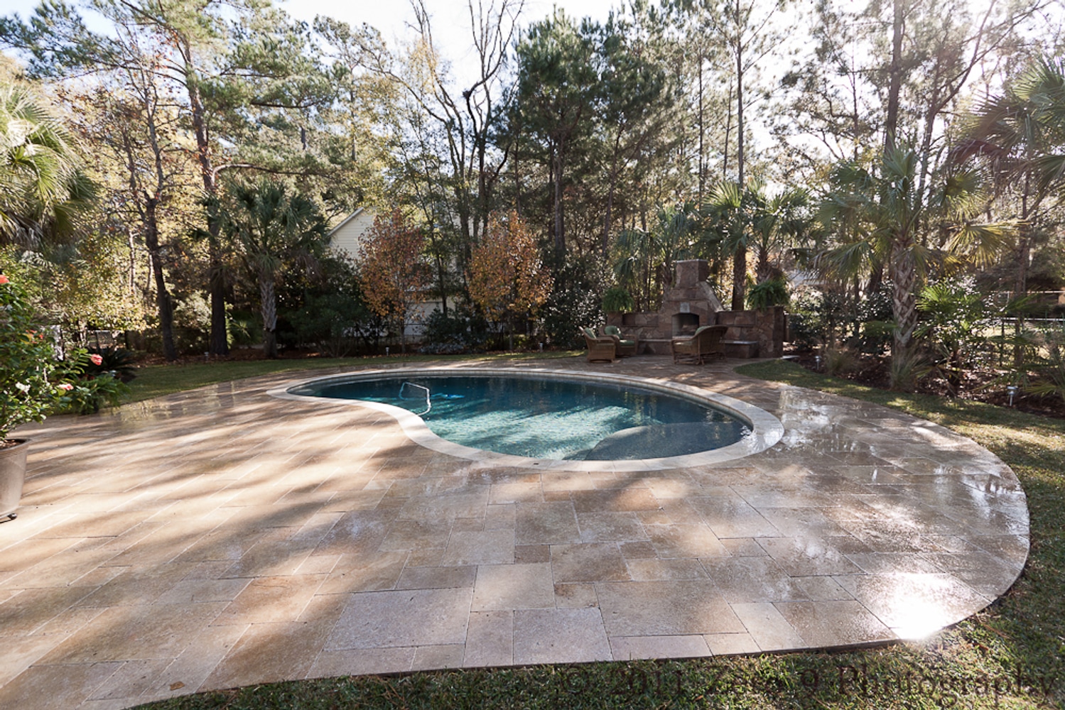 Travertine Pool Deck with custom design Oudoor Fireplace