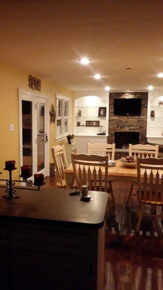bookshelves and stone work on old fireplace
