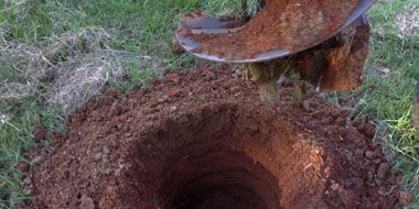 R.L. Noll - Elite FenceWorks Post hole digging and core drilling services