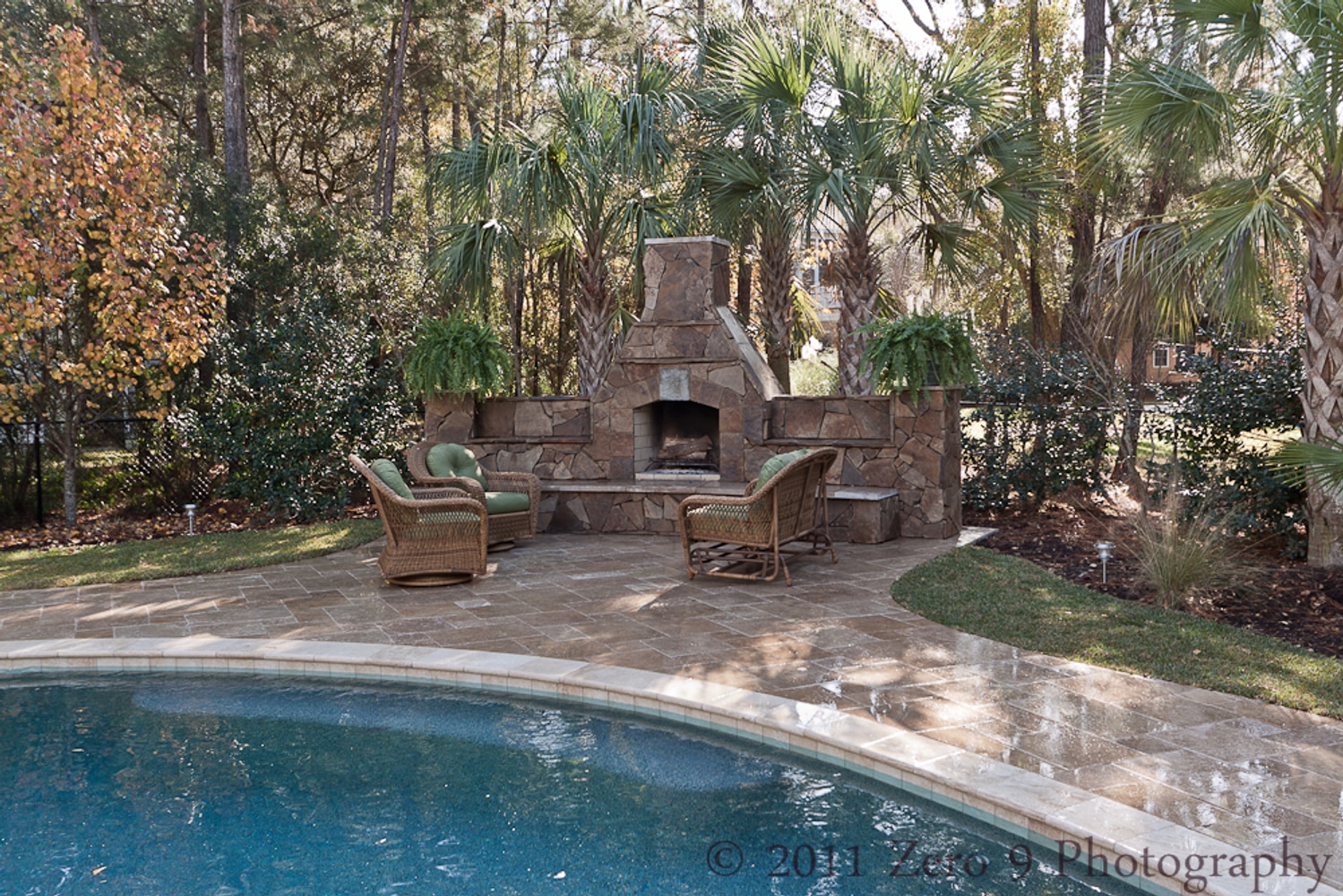 Travertine Pool Deck with custom design Oudoor Fireplace