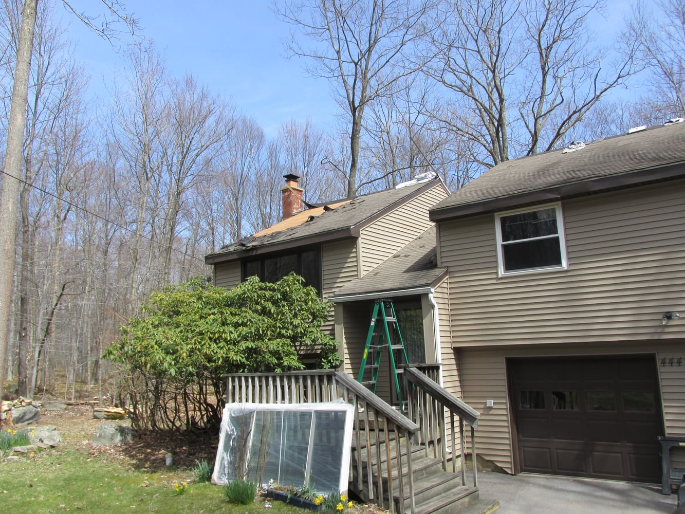 Window, Door, Fascia, Gutters, and a New Roof