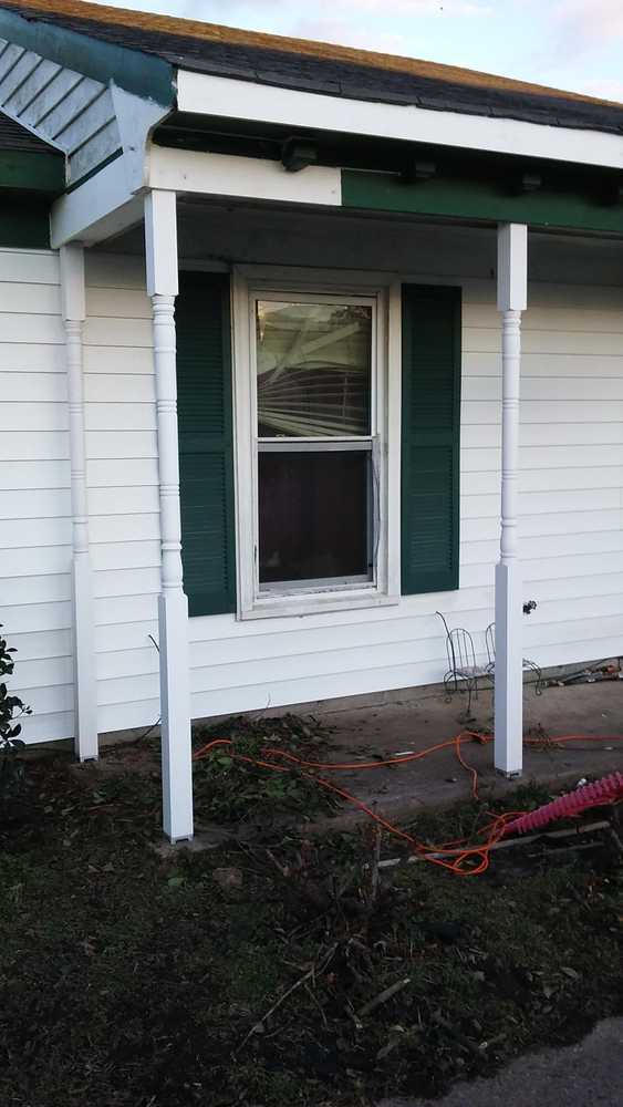 John's vinyl siding and shutter replacement job. Front porch posts replacement and rotted wood replacement and Repairs.