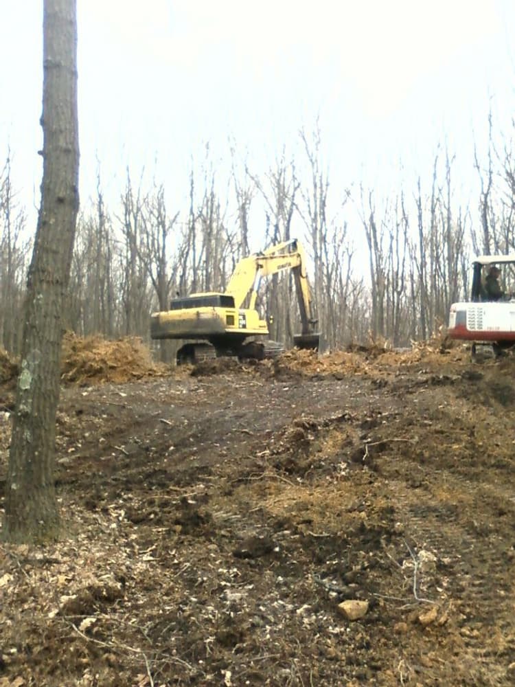 Tobin excavating Photos