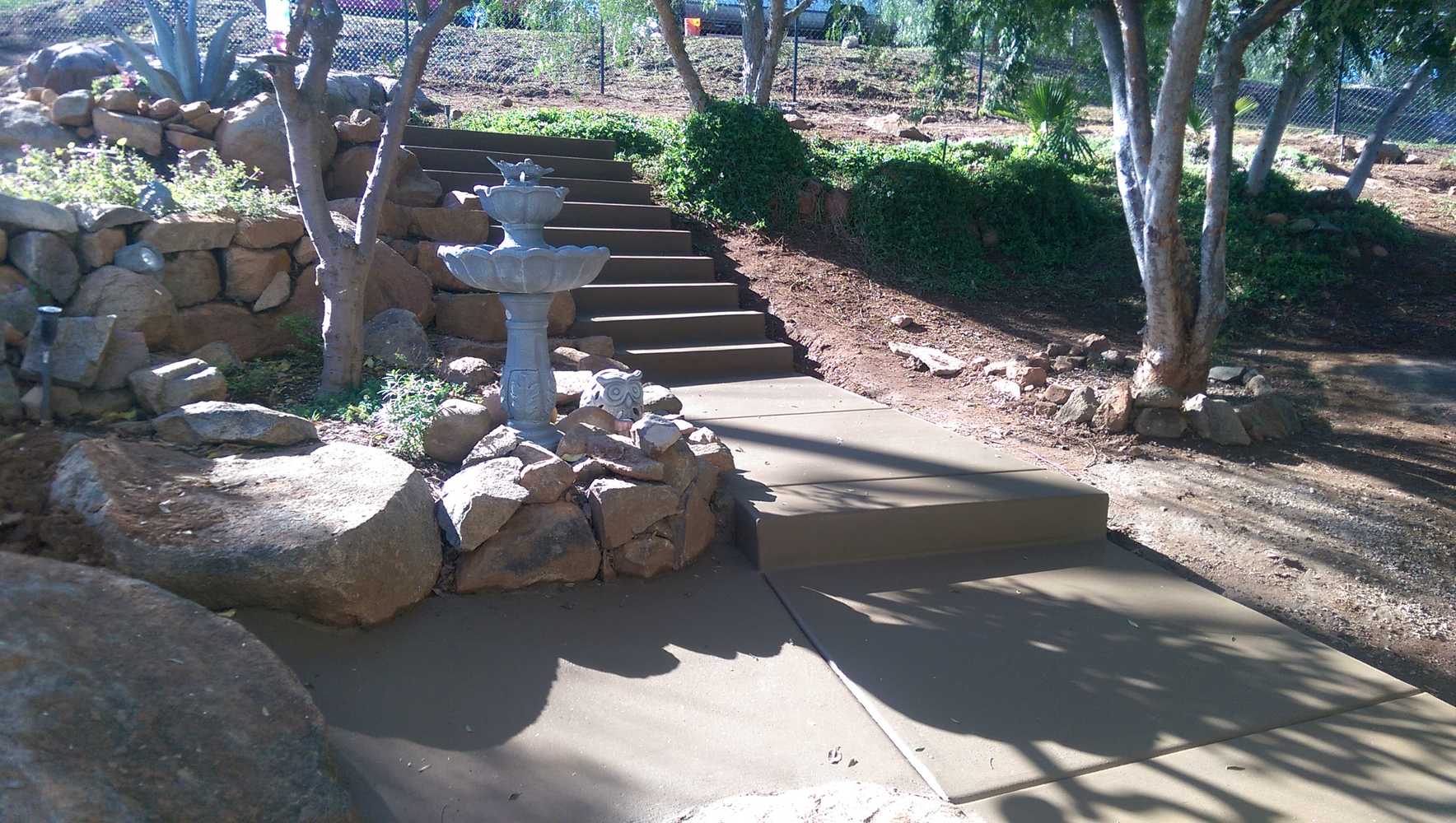 Colored concrete steps and walkway