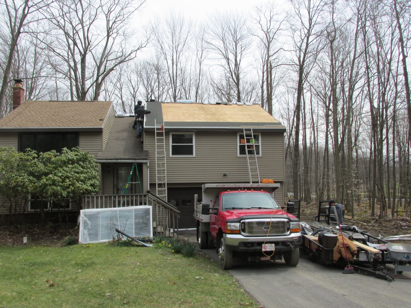 Window, Door, Fascia, Gutters, and a New Roof