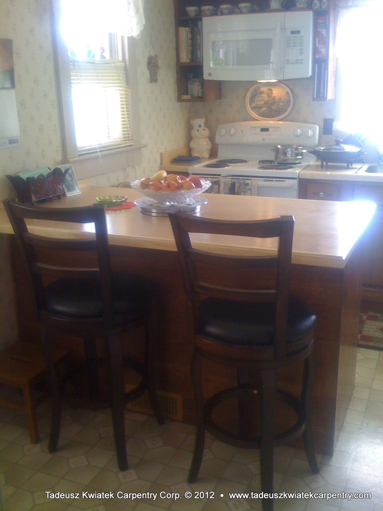 Small home remodel, Jasper, IN: deck and ramp, custom kitchen cabinets...