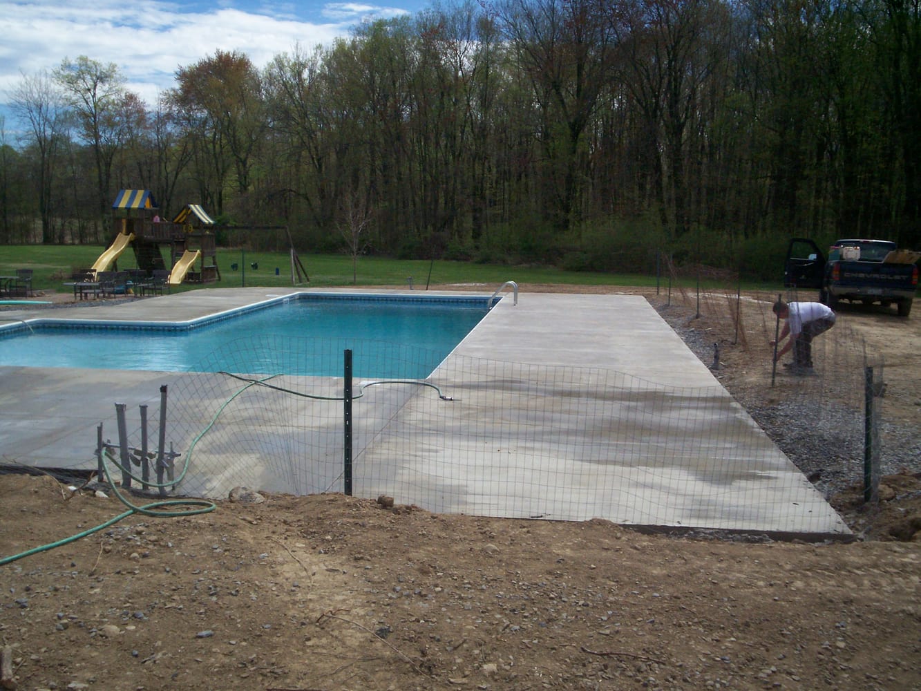 Concrete pool surround with broom finish