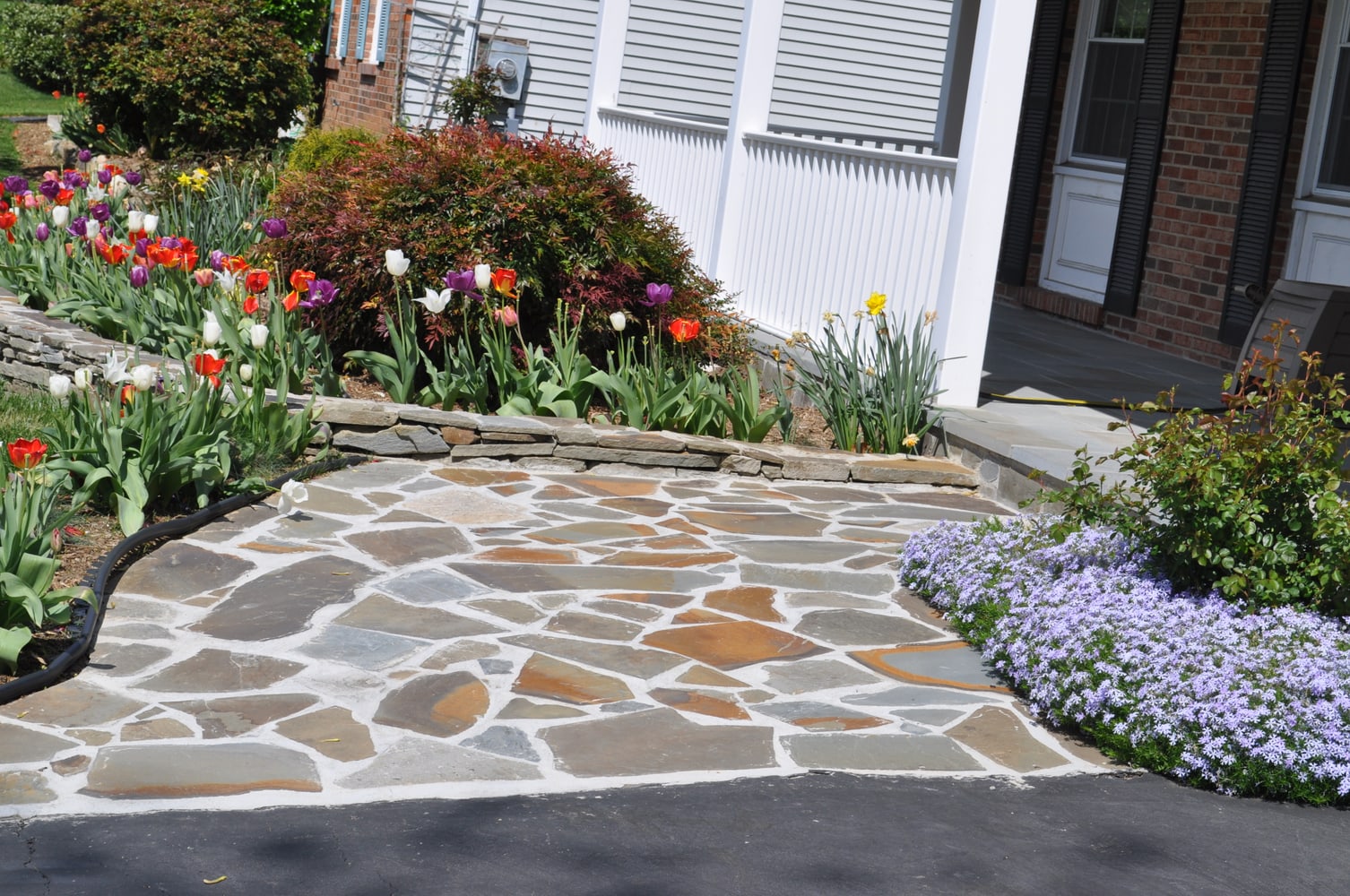 Stacked stone garden wall 