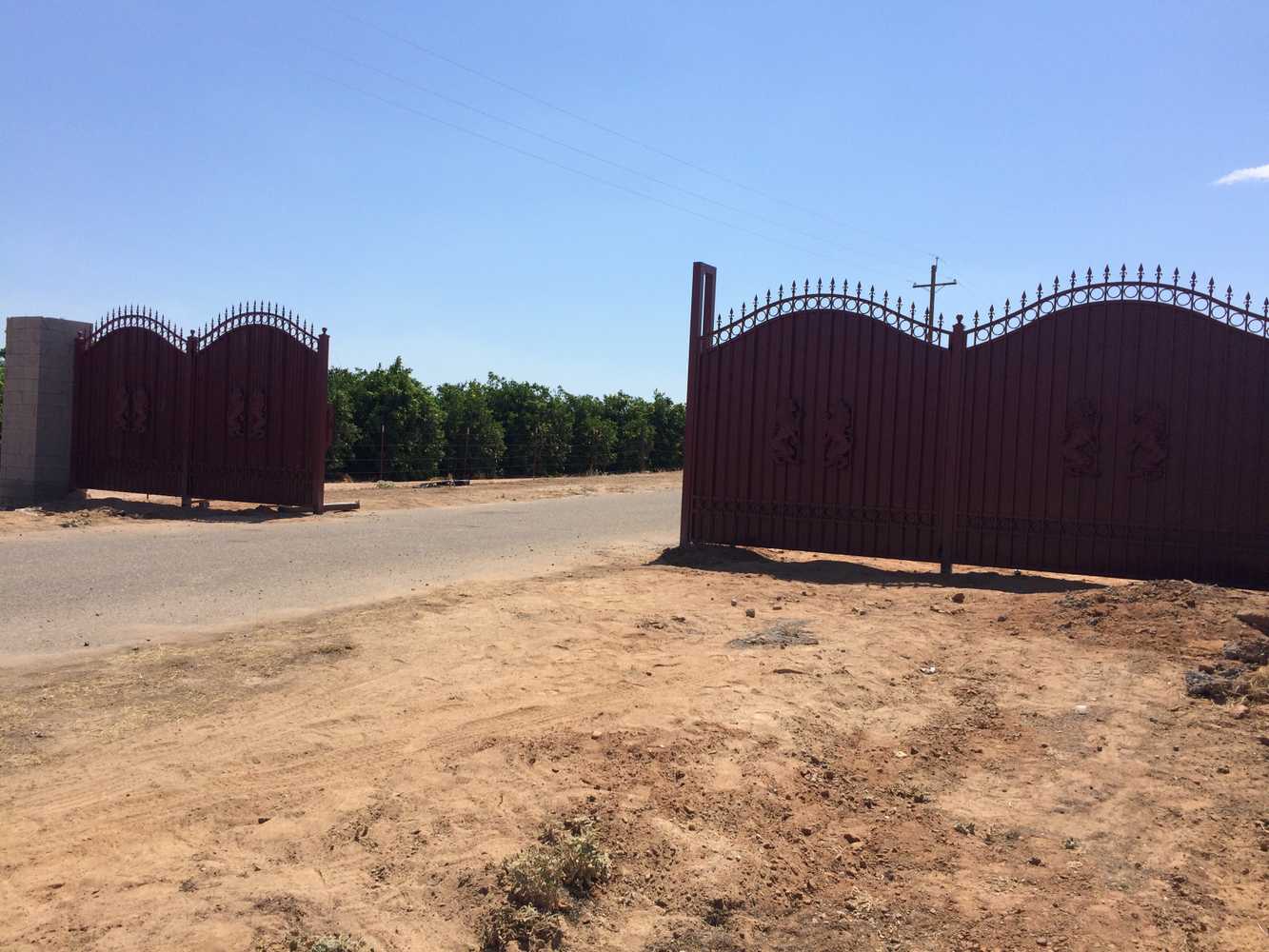 Wrought iron fence with gates at Madera Ranchos