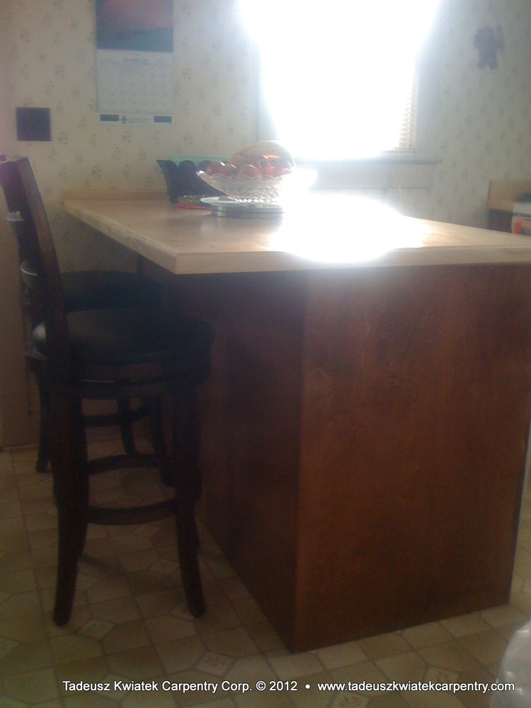 Small home remodel, Jasper, IN: deck and ramp, custom kitchen cabinets...