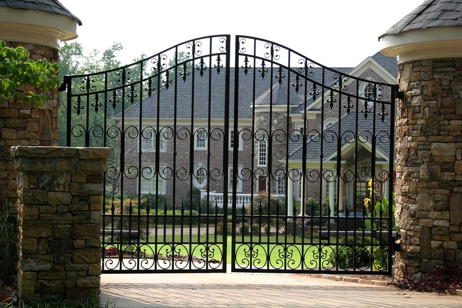 Residential Gates, Subdivision Entry gates, roadwork, stonework etc. Commercial gates