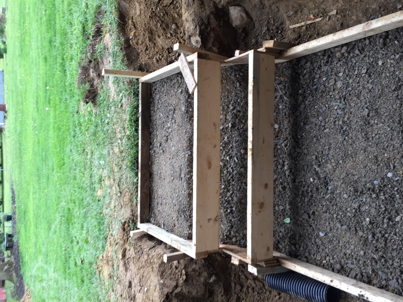 Retaining walls concrete pads and patio