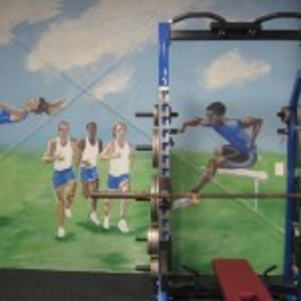 Rocket Club Weight Room by C.H.I. Construction Inc.