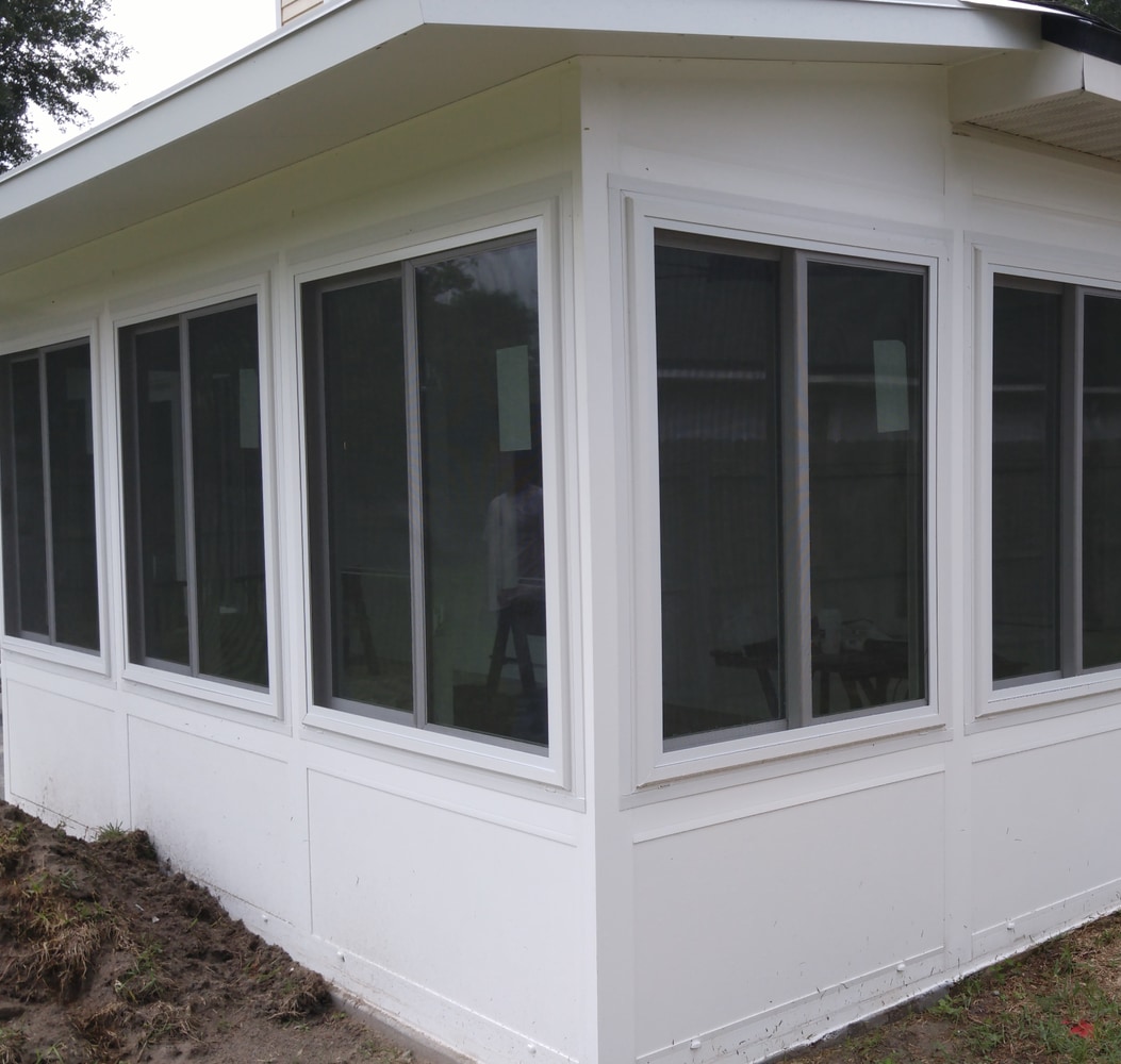 Nobles LivingSpace studio sunroom and paver patio